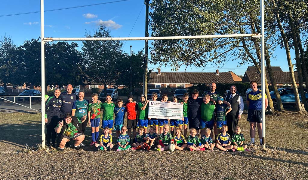 Hemsworth Dragons Football Club celebrating A N Abraham Community Assistance Programme award